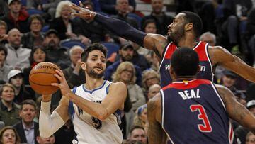 Mar 13, 2017; Minneapolis, MN, USA; Minnesota Timberwolves guard Ricky Rubio (9) looks to pass the ball as  Washington Wizards guard John Wall (2) defends in the third quarter at Target Center. Rubio sets a franchise record for assists with19 as the Timberwolves win 119-104. Mandatory Credit: Bruce Kluckhohn-USA TODAY Sports