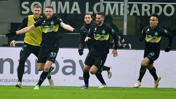 MILAN, ITALY - JANUARY 09: Milan Skriniar of FC Internazione celebrates a second goal with his team mates during the Serie A match between FC Internazionale v SS Lazio at Stadio Giuseppe Meazza on January 09, 2022 in Milan, Italy. (Photo by Marco Rosi - S