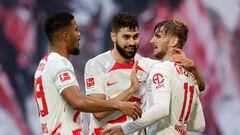 LEIPZIG, GERMANY - OCTOBER 29: Timo Werner celebrates with Josko Gvardiol and Benjamin Henrichs of RB Leipzig after scoring their team's second goal during the Bundesliga match between RB Leipzig and Bayer 04 Leverkusen at Red Bull Arena on October 29, 2022 in Leipzig, Germany. (Photo by Maja Hitij/Getty Images)
