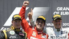 Fernando Alonso, junto a Kimi Raikkonen y Michael Schumacher en el podio de Valencia, otros dos campeones que volvieron a la F1.