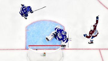 TAMPA, FLORIDA - JUNE 20: Gabriel Landeskog #92 of the Colorado Avalanche scores a goal agaisnt Andrei Vasilevskiy #88 of the Tampa Bay Lightning during the second period in Game Three of the 2022 NHL Stanley Cup Final at Amalie Arena on June 20, 2022 in Tampa, Florida. Tampa Bay defeated Colorado 6-2.   Julio Aguilar/Getty Images/AFP
== FOR NEWSPAPERS, INTERNET, TELCOS & TELEVISION USE ONLY ==