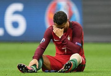 Ronaldo shows his emotion before being taken off injured in the first half.