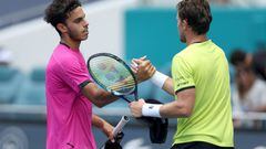 MIAMI GARDENS, FLORIDA - APRIL 01: Francisco Cerundolo of Argentina congratulates Casper Ruud of Norway after their match during the semifinals of the Miami Open at Hard Rock Stadium on April 1, 2022 in Miami Gardens, Florida. (Photo by Matthew Stockman/Getty Images)