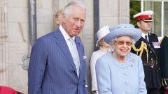 Prince of Wales and Queen Elizabeth II attending the Queen's Body Guard for Scotland (also known as the Royal Company of Archers) Reddendo Parade in the gardens of the Palace of Holyroodhouse, Edinburgh. Picture date: Thursday June 30, 2022.