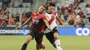 Madson of Brazil&#039;s Atletico Paranaense, left, competes for the ball with Fabrizio Angileri of Argentina&#039;s River Plate during a Recopa Sudamericana first leg final soccer match in Curitiba, Brazil, Wednesday, May 22, 2019. (AP Photo/Giuliano Gomes)