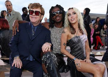 Elton John alongside Lil Nas X and Miley Cyrus at the Versace Fall-Winter 2023 event in Los Angeles.