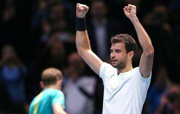 Dimitrov celebrates after defeating Goffin in London.