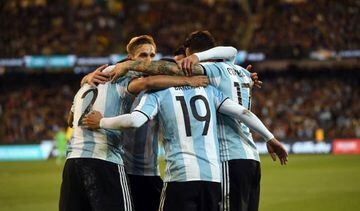 Argentina's players celebrate their first goal of Gabriel Mercado during their friendly international football match between Brazil and Argentina at the MCG in Melbourne on June 9, 2017.