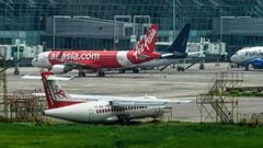 Air planes are seen parked at the Netaji Subhash Chandra Bose International Airport, as flight operations are suspended from July 25 to 29 as part of the the state-government lockdown imposed to fight against the spread of the COVID-19 coronavirus, in Kol