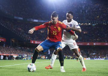 SEVILLE, SPAIN - OCTOBER 15:  Raheem Sterling of England duels for the ball with Sergio Ramos of Spain during the UEFA Nations League A Group Four match between Spain and England at Estadio Benito Villamarin on October 15, 2018 in Seville, Spain.  (Photo 