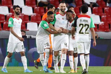 Al-Jazira's defender Milos Kosanovic (C) celebrates with his team after scoring the third goal during the 2021 FIFA Club World Cup football match between UAE's Al-Jazira and Tahiti's AS Pirae at Mohammed Bin Zayed stadium in Abu Dhabi on February 3, 2022.