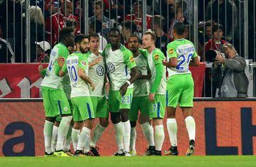 Wolfsburg's Daniel Didavi celebrates scoring their second goal with team mates.