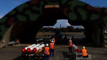 FILE PHOTO: Air force soldiers load U.S. made Harpoon AGM-84 anti-ship missiles at a combat readiness mission during a press invited event at the airbase in Hualien, Taiwan, August 17, 2022. REUTERS/Ann Wang/File Photo