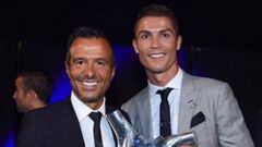 El futbolista del Real Madrid, Cristiano Ronaldo y su representante, Jorge Mendes.