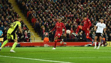 LIVERPOOL, ENGLAND - APRIL 13: ( THE SUN OUT,THE SUN ON SUNDAY OUT ) Roberto Firmino of Liverpool scores the third goal making the score 3-1  during the UEFA Champions League Quarter Final Leg Two match between Liverpool FC and SL Benfica at Anfield on April 13, 2022 in Liverpool, England. (Photo by Andrew Powell/Liverpool FC via Getty Images)