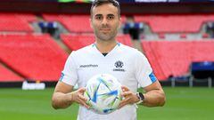 LONDON, ENGLAND - MAY 31: Piero Daniel Maza Gomez, Match Referee poses for a photo with the match ball during the Referee Team Training Session at Wembley Stadium on May 31, 2022 in London, England. (Photo by Michael Regan - UEFA/UEFA via Getty Images)