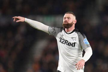(FILES) In this file photo taken on March 5, 2020 Derby County's English striker Wayne Rooney reacts during the English FA Cup fifth round football match between Derby County and Manchester United