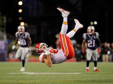 Kansas City Chiefs tight end Travis Kelce (87) is upended after making a catch during the fourth quarter against the New England Patriots.