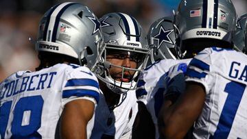 CHARLOTTE, NORTH CAROLINA - NOVEMBER 19: Dak Prescott #4 of the Dallas Cowboys huddles up with his team during the third quarter in the game against the Carolina Panthers at Bank of America Stadium on November 19, 2023 in Charlotte, North Carolina.   Eakin Howard/Getty Images/AFP (Photo by Eakin Howard / GETTY IMAGES NORTH AMERICA / Getty Images via AFP)
