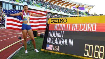 Gold medallist Sydney McLaughlin celebrates after winning the women's 400 metres hurdles final and setting a new world record.