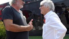 Briatore charla con Ecclestone en Monza.