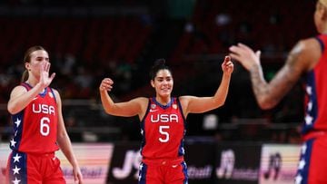 Kelsey Plum celebrates with Sabrina Ionescu in the game against Korea
