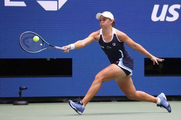 Ashleigh Barty of Australia returns the ball against Vera Zvonareva of Russia during her Women's Singles first round match on Day Two