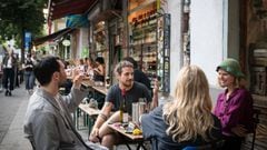BERLIN, GERMANY - JUNE 05: People sit outside a bar during the coronavirus pandemic on June 4, 2021 in Berlin, Germany. Authorities are further easing lockdown measures nationwide as Germany reopens commercial and cultural venues. The number of people in 