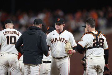 SAN FRANCISCO, CALIFORNIA - OCTOBER 08: Logan Webb #62 of the San Francisco Giants is taken out of the game by manager Gabe Kapler #19 against the Los Angeles Dodgers during the eighth inning of Game 1 of the National League Division Series at Oracle Park