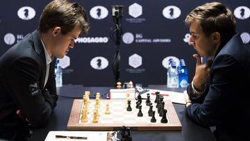 Magnus Carlsen, con blancas, y Sergei Karjakin, tablas en la primera partida.