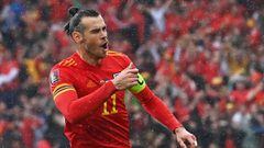 Wales&#039; striker Gareth Bale celebrates after scoring the opening goal during the FIFA World Cup 2022 play-off final qualifier football match between Wales and Ukraine at the Cardiff City Stadium in Cardiff, south Wales, on June 5, 2022. (Photo by Paul