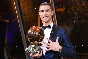 Cristiano Ronaldo with the Ballon d'Or, which he was awarded for the fifth time in his career on Thursday.
