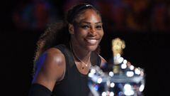 Serena Williams of the US looks at the championship trophy during the awards ceremony after her victory against Venus Williams of the US in the women&#039;s singles final on day 13 of the Australian Open tennis tournament in Melbourne on January 28, 2017.