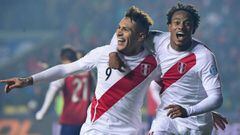 (FILES) This file photo taken on July 03, 2015 shows Peru&#039;s forward Paolo Guerrero (L) celebratING with teammate Andre Carrillo after scoring against Paraguay during the Copa America third place football match in Concepcion, Chile on July 3, 2015.  