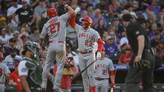 DENVER, CO - JUNE 24: Mike Trout #27 of the Los Angeles Angels celebrates with Brandon Drury #23 after hitting a third inning solo homerun in a game against the Colorado Rockies at Coors Field on June 24, 2023 in Denver, Colorado.   Dustin Bradford/Getty Images/AFP (Photo by Dustin Bradford / GETTY IMAGES NORTH AMERICA / Getty Images via AFP)