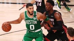 Sep 19, 2020; Lake Buena Vista, Florida, USA; Boston Celtics forward Jayson Tatum (0) dribbles the ball against Miami Heat forward Bam Adebayo (13) during the second half of game three of the Eastern Conference Finals of the 2020 NBA Playoffs at ESPN Wide