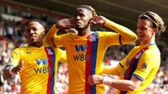 Crystal Palace&#039;s Wilfried Zaha, center, celebrates scoring their side&#039;s second goal of the game during their English Premier League soccer match against Southampton at St Mary&#039;s Stadium, Southampton, England, Saturday, April 30, 2022. (Andr