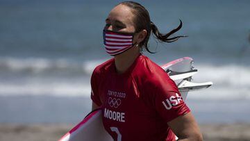 How many surfing world titles has Carissa Moore won?
