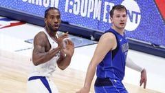 Jun 4, 2021; Dallas, Texas, USA; LA Clippers forward Kawhi Leonard (2) and Dallas Mavericks guard Luka Doncic (77) react after a Leonard shot during the fourth quarter during game six in the first round of the 2021 NBA Playoffs at American Airlines Center
