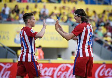 Kevin Gameiro and Filipe Luis celebrate the first of Atleti's five goals against Las Palmas at the weekend.