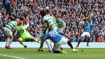 GLASGOW, SCOTLAND - MARCH 11:  Daniel Joao Santos Candeias of Rangers scores his sides second goal past Scott Bain of Celtic during the Ladbrokes Scottish Premiership match between Rangers and Celtic at Ibrox Stadium on March 11, 2018 in Glasgow, Scotland