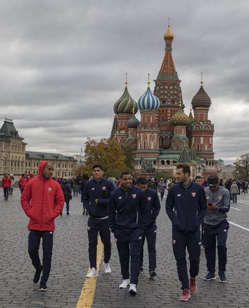 Sevilla players on Red Square in Moscow with Saint Basil's Cathedral in the background.