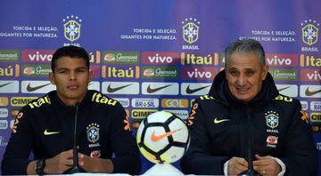 Brazil's player Thiago Silva (L) and head coach Tite attend a press conference following a training session in Melbourne on June 8, 2017, ahead of their football match against Argentina on June 9.