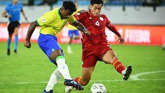 Brazil's Endrick (L) and Colombia's Fernando Alvarez (R) fight for the ball during the Venezuela 2024 CONMEBOL Pre-Olympic Tournament Group A football match between Brazil and Colombia at the Brigido Iriarte stadium in Caracas, on January 26, 2024. (Photo by Federico Parra / AFP)