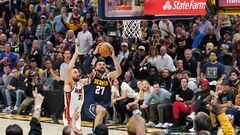 Jun 4, 2023; Denver, CO, USA; Denver Nuggets guard Jamal Murray (27) shoots the ball against Miami Heat guard Max Strus (31) during the first half in game two of the 2023 NBA Finals at Ball Arena. Mandatory Credit: Kyle Terada-USA TODAY Sports