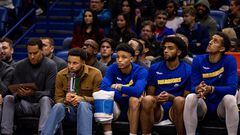 Golden State Warriors forward Anthony Lamb (40) and guard Ryan Rollins (2) and forward Anthony Lamb (40) and forward Patrick Baldwin Jr. (7) looks on from the bench against the New Orleans Pelicans during the second half at Smoothie King Center.