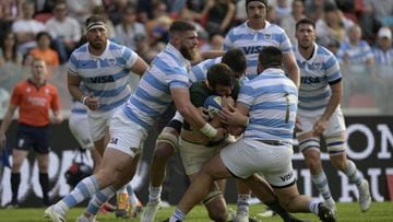 South Africa's Springboks lock Lood De Jager (C) is tackled by Argentina's Los Pumas flanker Marcos Kremer (2-L), N8 Pablo Matera (back) and prop Nahuel Tetaz Chaparro during the Rugby Championship match Argentina's Los Pumas at Libertadores de America stadium in Avellaneda, Buenos Aires on September 17, 2022. (Photo by JUAN MABROMATA / AFP) (Photo by JUAN MABROMATA/AFP via Getty Images)