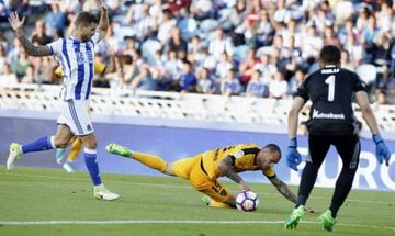 Sandro goes down under a challenge against Real Sociedad.