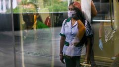 A woman wearing a face masks as a preventive measures against the spread of the novel coronavirus COVID-19 is pictured at a metro station in Medellin, Colombia, on April 28, 2020. - More than 214,451 people have died worldwide since the epidemic surfaced 