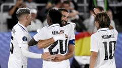 Real Madrid's Karim Benzema celebrates scoring their second goal with Federico Valverde, Vinicius Junior and Luka Modric.